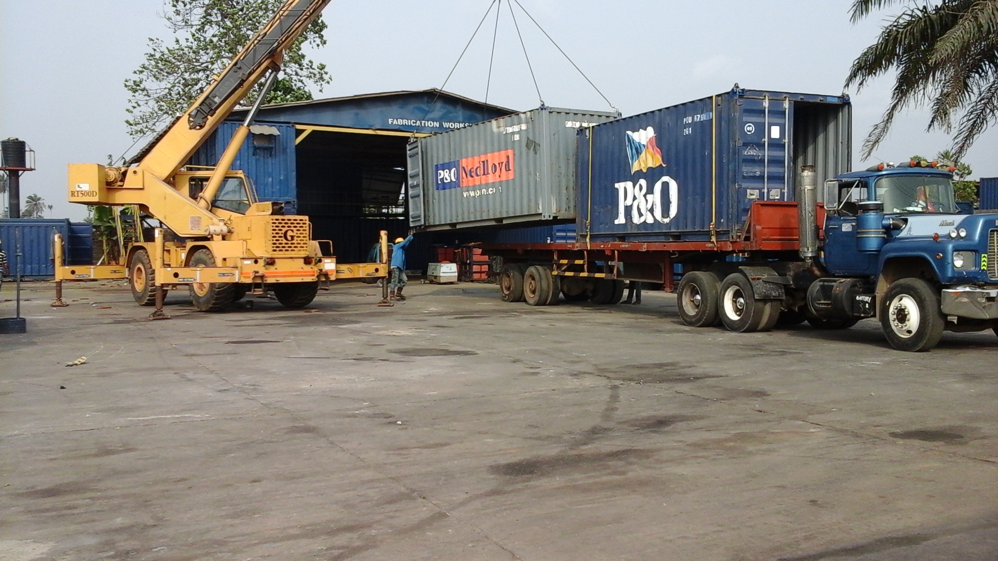 container-loading-on-truck-showing-crane